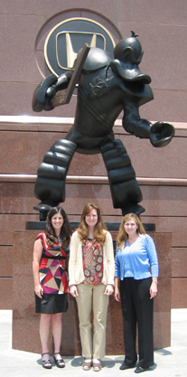 TEAM IDP participants proudly stand in front of the Mighty Duck statue outside Honda Center